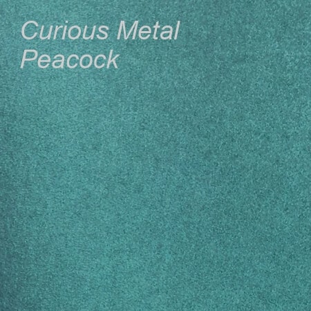 Teal peacock metallic textured paper swatch with the words Curious Metal Peacock printed across the surface in soft, fine grain detail.